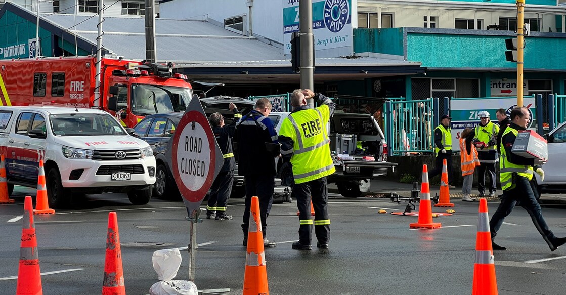 Fire and emergency crews working at the scene of a fire at the Loafers Lodge, in Wellington, New Zealand on Tuesday. Photo: REUTERS/Lucy Craymer