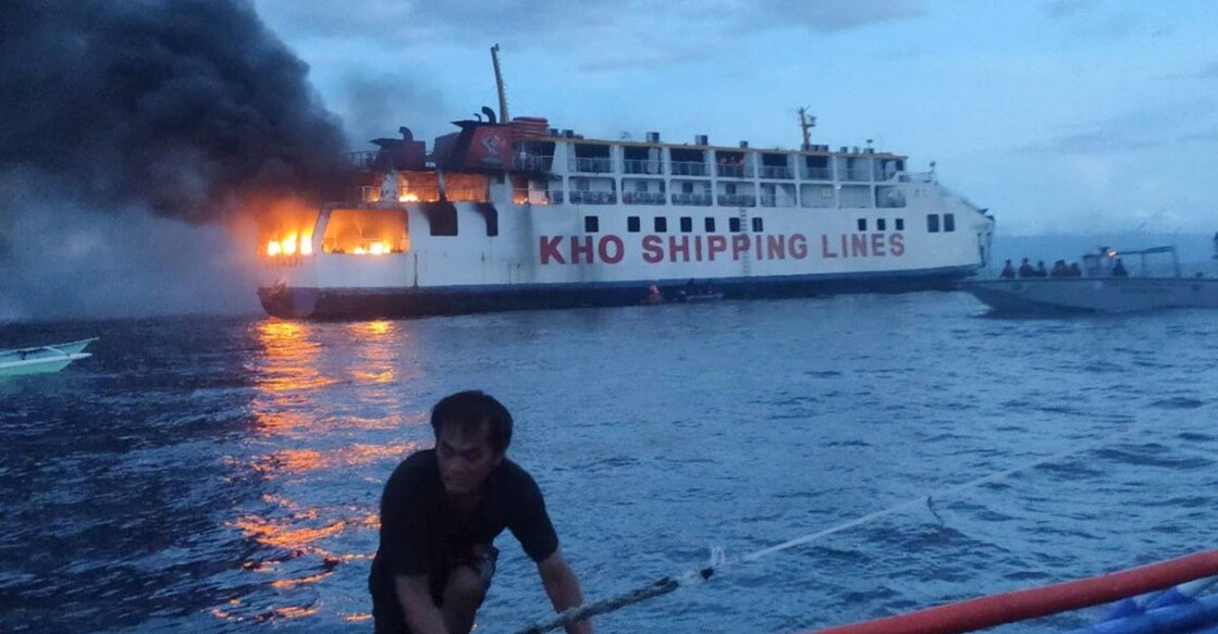 Photos and video released by the coast guard show flames and black smoke billowing from two decks at one end of the ferry as coast guard personnel onboard another vessel used a water cannon to try to put out the fire. Photo: AP/PTI