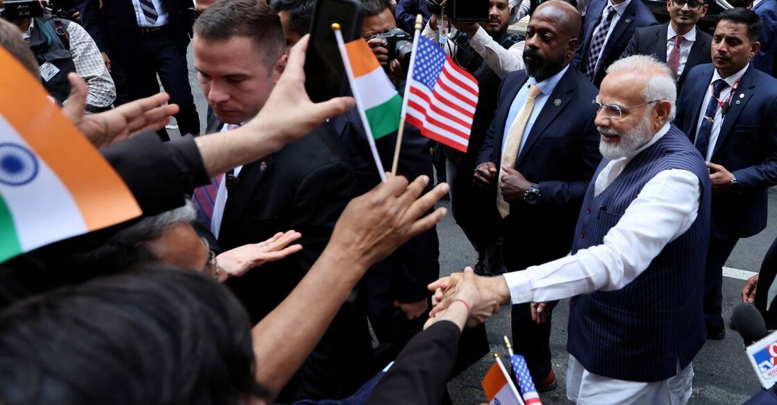 Prime Minister Narendra Modi waves to supporters as he arrives at the Lotte hotel in New York City. Photo: Reuters