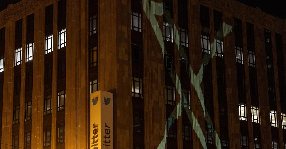 Twitter's new logo is seen projected on the corporate headquarters building in downtown San Francisco, California, U.S. July 23, 2023. REUTERS/Carlos Barria
