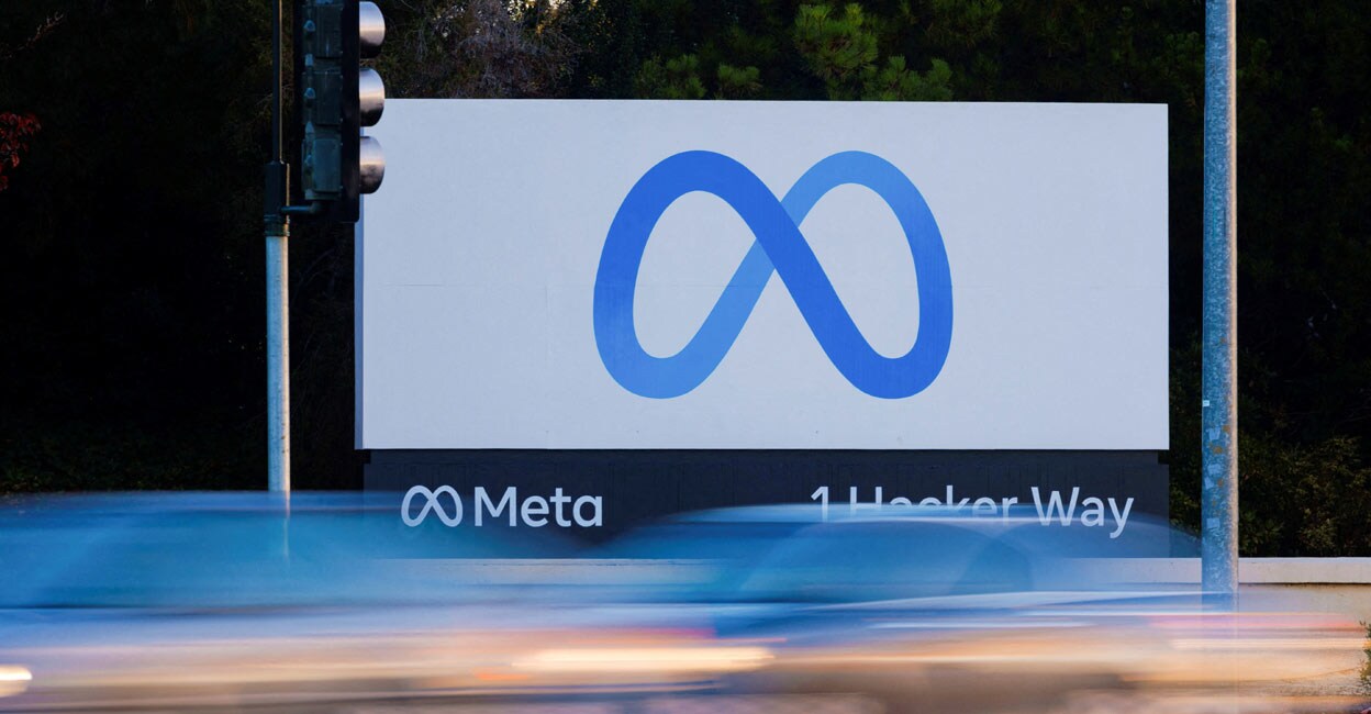 Morning commute traffic streams past the Meta sign outside the headquarters of Facebook parent company Meta Platforms Inc. Photo: REUTERS/Peter DaSilva