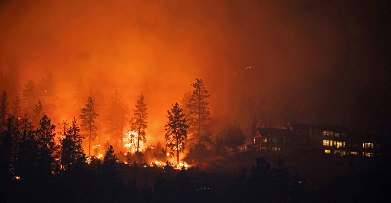 bc-wildfire-2 The McDougall Creek wildfire burns next to houses in the Okanagan community of West Kelowna, British Columbia, Canada, August 19, 2023. Photo: Reuters/Chris Helgren
