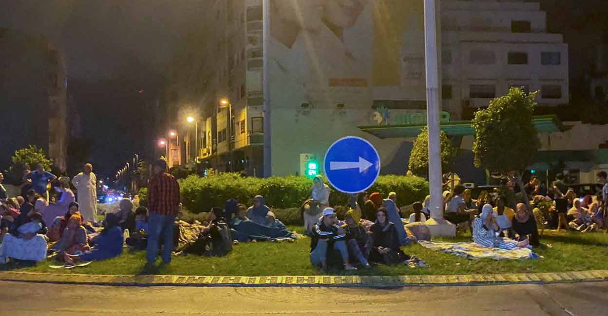 MOROCCO-QUAKE People gather on a street in Casablanca, following a powerful earthquake in Morocco, September 9, 2023. Photo: REUTERS/Abdelhak Balhaki
