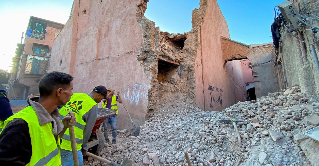 morocco-quake-1 People work next to damage in the historic city of Marrakech, following a powerful earthquake in Morocco, September 9, 2023. Photo: Reuters/Abdelhak Balhaki