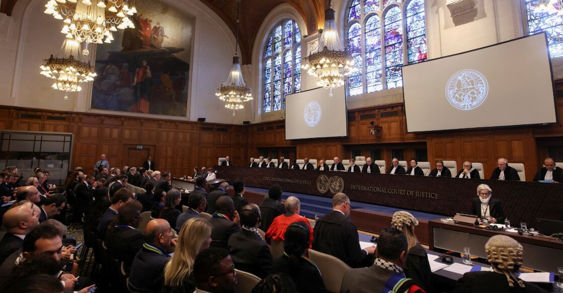 People sit inside the International Court of Justice (ICJ) on the day of the trial to hear a request for emergency measures by South Africa. Photo: Reuters/Thilo Schmuelgen