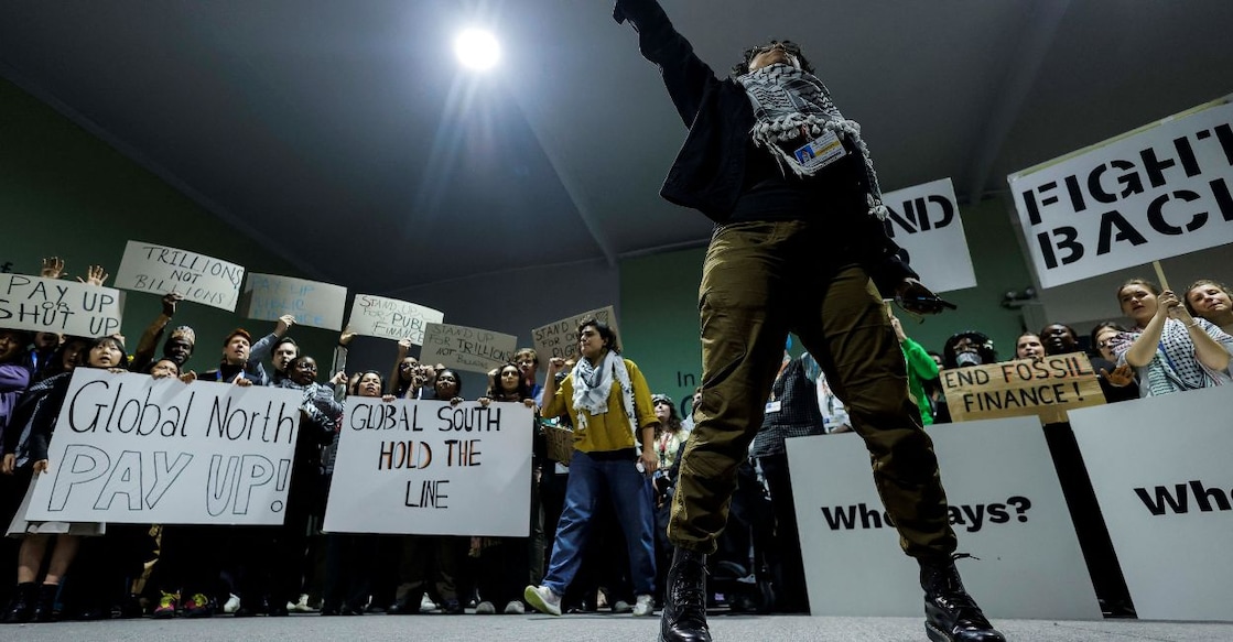 cop29-climate-change.jpg Activists shout slogans during a protest action at the COP29 United Nations climate change conference, in Baku, Azerbaijan November 23, 2024. Photo: Reuters/Maxim Shemetov