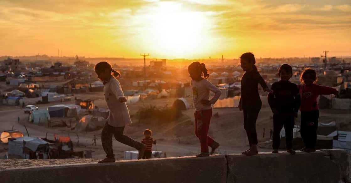 A child growing up in a conflict zone is far more likely to be out of school, malnourished, or forced from their home. Photo: AFP
