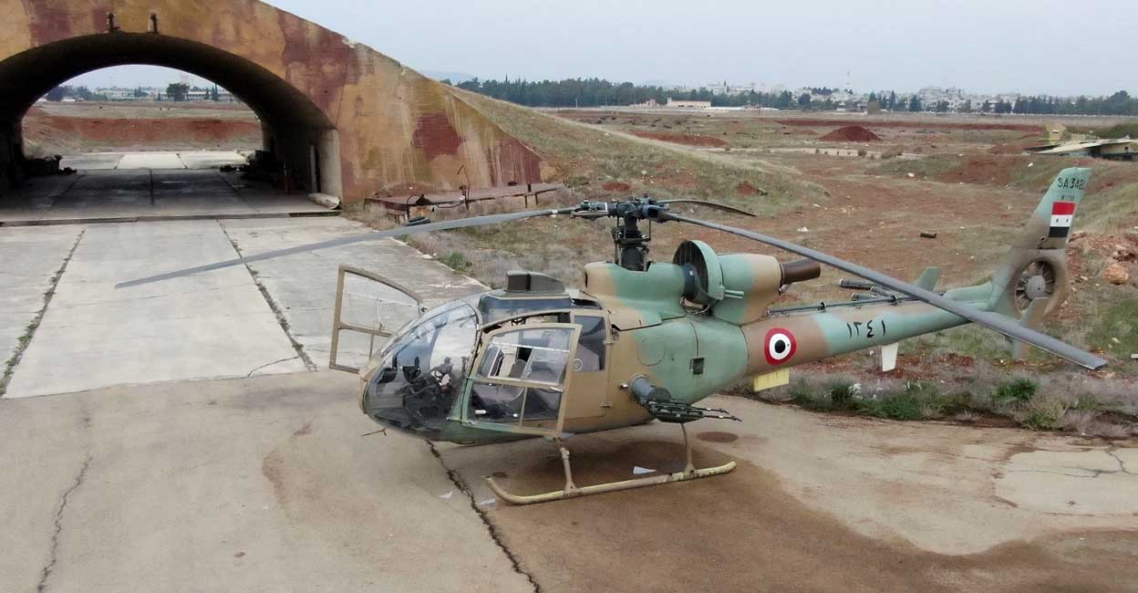 SYRIA-SECURITY A helicopter belonging to forces loyal to the Bashar al-Assad government at Hama's military airport lay abandoned. Photo: Reuters/Mahmoud Hasano
