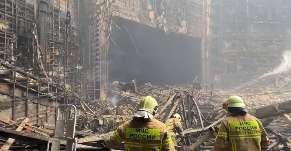 Rescuers work inside the Crocus City Hall, a day after a gun attack in Krasnogorsk, outside Moscow. Photo: AFP