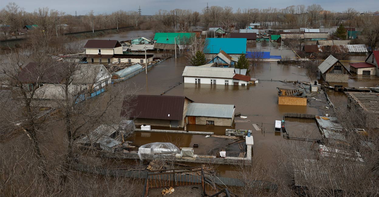 Russian city calls for mass evacuation as flood waters surge