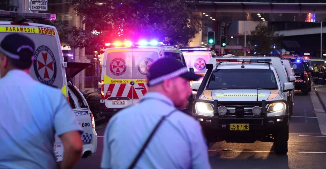 Ambulances make their way outside the Westfield Bondi Junction shopping mall after a stabbing incident in Sydney . Photo: AFP