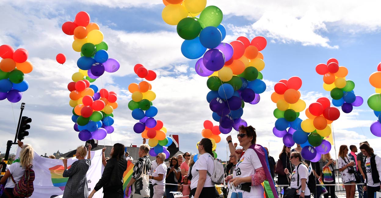 People march during the annual Gay Pride parade in central Stockholm, Sweden August 5, 2017. Photo: File/ Reuters. 