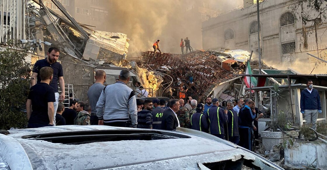 Smoke rises after what the Iranian media said was an Israeli strike on a building close to the Iranian embassy in Damascus, Syria. Photo: Reuters.