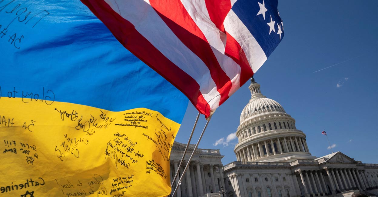 Flags flutter as pro-Ukrainian supporters demonstrate outside the US Capitol, April 20, 2024. Photo: Reuters.