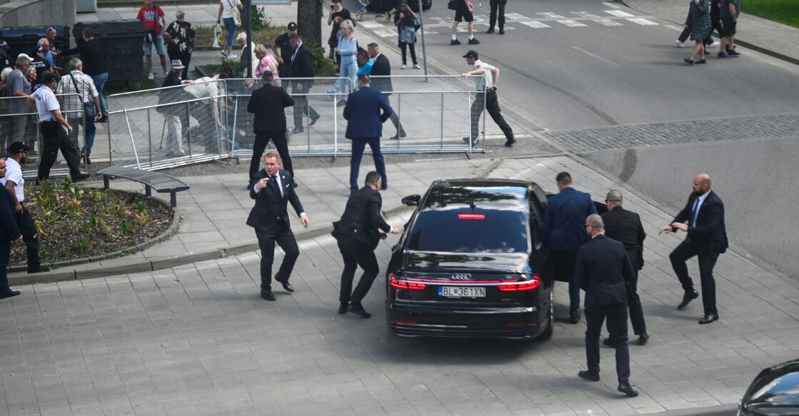 Security officers move Slovak PM Robert Fico in a car after a shooting incident, after a Slovak government meeting in Handlova, Slovakia, May 15, 2024. Photo: Reuters/Radovan Stoklasa