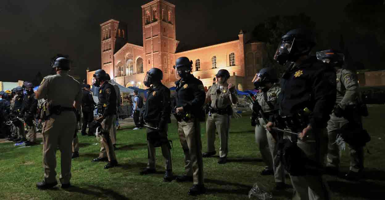 ISRAEL-PALESTINIANS-USA-PROTESTS CHP officers stand guard near an encampment by supporters of Palestinians in Gaza, on the University of California, Los Angeles (UCLA) campus, amid the ongoing conflict between Israel and the Palestinian Islamist group Hamas, in Los Angeles, California, U.S., May 1, 2024. Photo: REUTERS/David Swanson