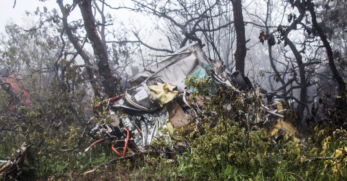 A view of the wreckage of Iranian president Ebrahim Raisi's helicopter at the crash site on a mountain in Varzaghan area. Photo: WANA/Reuters