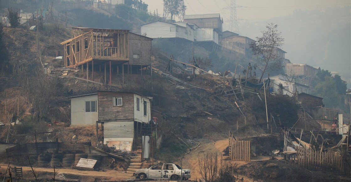 The remains of a burnt house are pictured following the spread of wildfires affecting many parts of the Valparaiso region, in Vina del Mar, Chile February 3, 2024. File Photo: Reuters. 