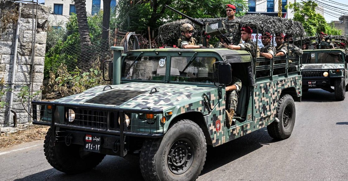 lebanese-army-c Lebanese army vehicles move along a road as soldiers deploy near the US embassy in Beirut . Photo: AFP