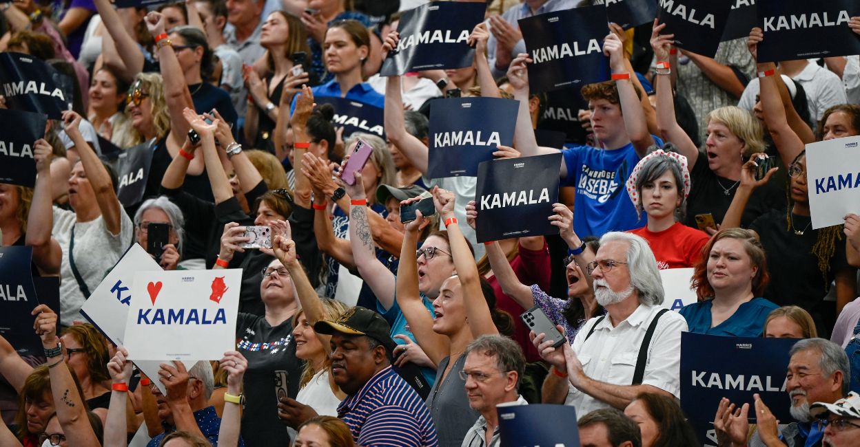 kamala-harris-campaign-1.jpg Supporters of Kamala Harris hold campaign signs. Photo: Reuters/Vincent Alban