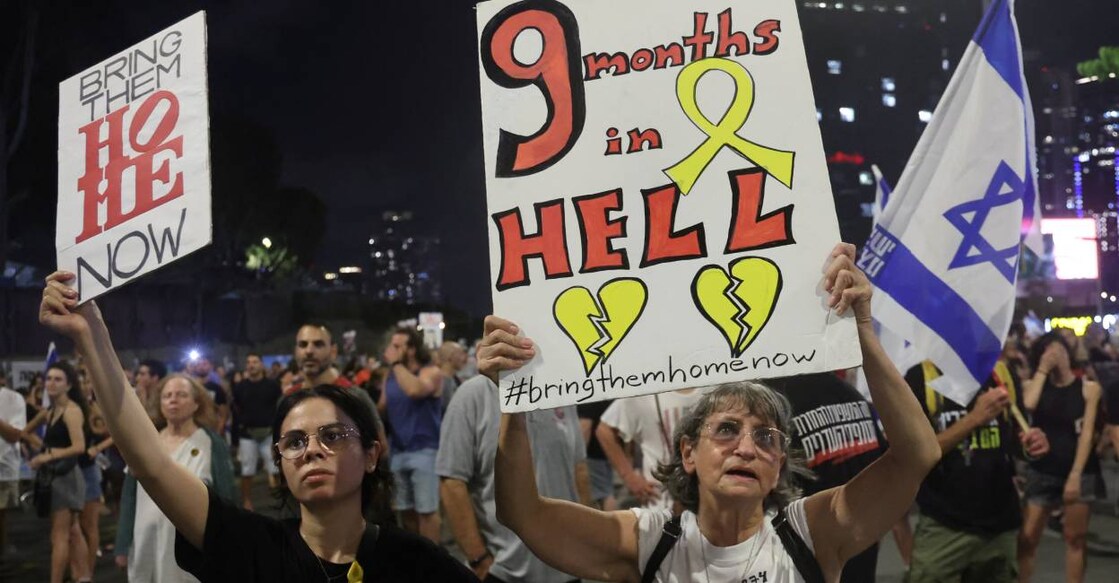 Protesters hold placards during a demonstration of supporters and relatives of Israelis held hostage by Palestinian militants in Gaza since the October 7 attacks, in Tel Aviv on July 6, 2024 amid the ongoing conflict in the Gaza Strip between Israel and Hamas. Photo: AFP