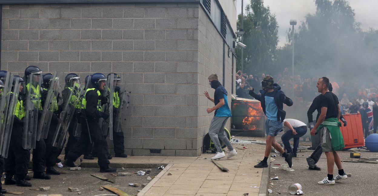 uk-riots.jpg Demonstrators clash with police officers during an anti-immigration protest, in Rotherham, Britain, August 4, 2024. Photo: Reuters/Hollie Adams