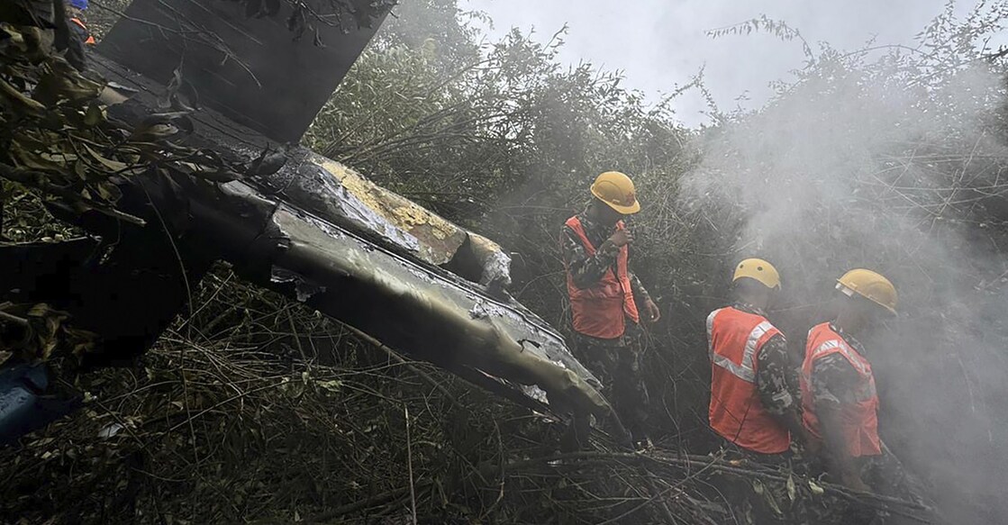 Rescuers work at the site of a helicopter that crashed in Suryachaur area, which is just northwest of Kathmandu, Nepal, Wednesday, Aug. 7, 2024. Photo: AP Photo/Nirajan Shrestha via PTI