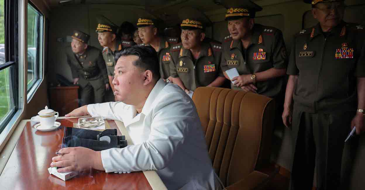 North Korean leader Kim Jong Un attends the test of an upgraded 240 mm rocket launcher system, in North Korea File Photo: KCNA via REUTERS