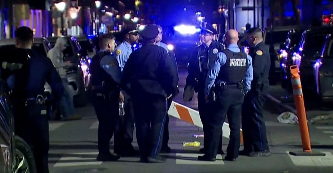Police officers stand at the scene where a truck drove into a large crowd on Bourbon Street in the French Quarter of New Orleans, Louisiana, US, January 1, 2025, in this screengrab taken from a video. Photo: ABC Affiliate WGNO/Handout via Reuters