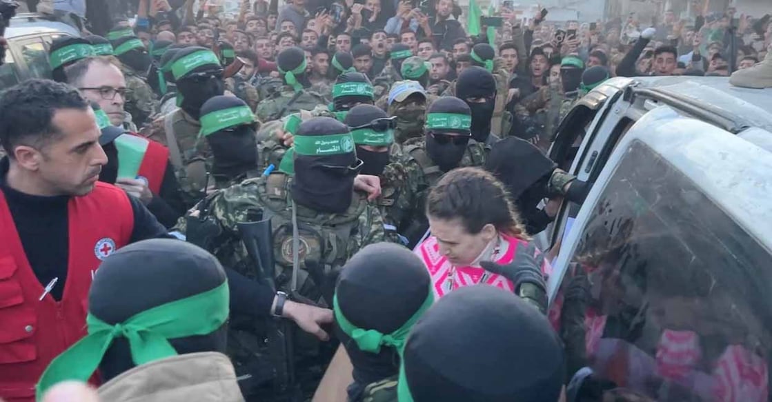 Palestinian Hamas militants hand over hostages, Gaza City, January 19, 2025.  Photo: Reuters.
