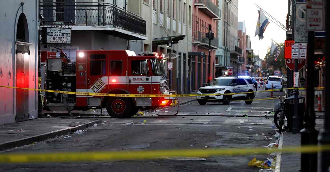 A fire truck and a police vehicle operate near the site where people were killed by a man driving a truck in an attack during New Year's celebrations, in New Orleans, Louisiana, U.S. January 1, 2025. Photo: REUTERS/Octavio Jones