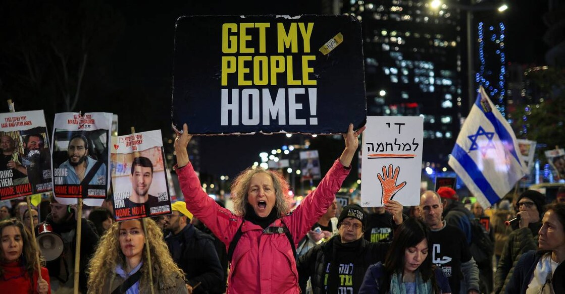 Demonstrators hold signs and pictures of hostages, as relatives and supporters of Israeli hostages kidnapped during the October 7, 2023 attack by Hamas protest demanding the release of all hostages in Tel Aviv, Israel. Photo: Reuters
