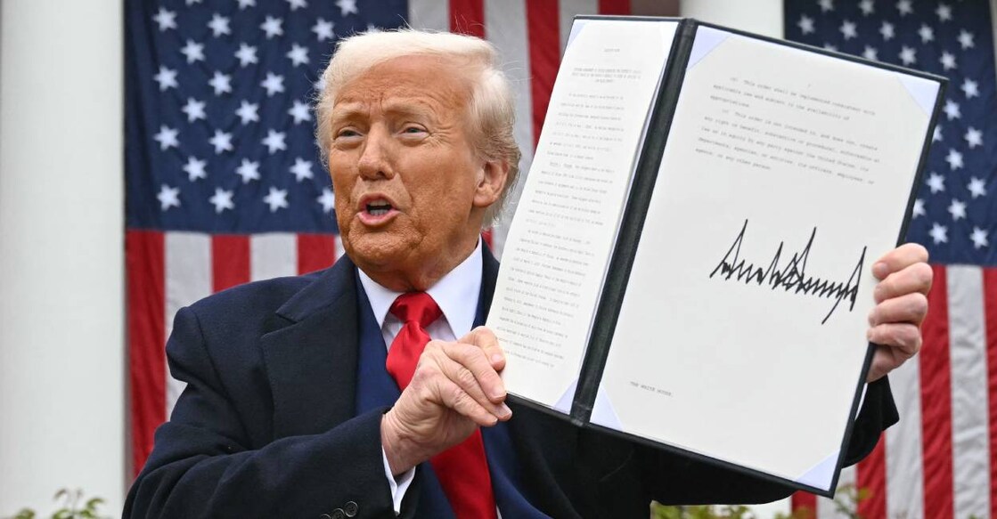 US President Donald Trump holds a signed executive order after delivering remarks on reciprocal tariffs during an event in the Rose Garden entitled "Make America Wealthy Again" at the White House in Washington, DC. Photo: AFP