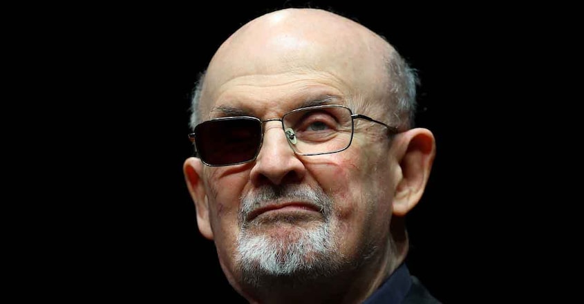 PEOPLE-SALMAN-RUSHDIE-READING Author Salman Rushdie poses during a photocall ahead of the presentation of his book "Knife: Meditations After an Attempted Murder" at the Deutsches Theater in Berlin, Germany, May 16, 2024. REUTERS/Fabrizio Bensch/File Photo