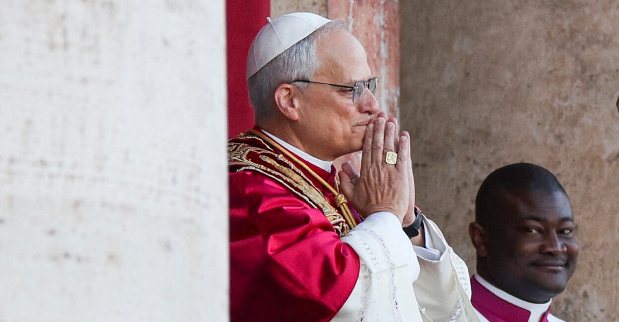 Newly elected Pope Leo XIV, Cardinal Robert Prevost of the United States, appears at the balcony of St. Peter's Basilica at the Vatican, May 8, 2025. REUTERS/Stoyan Nenov