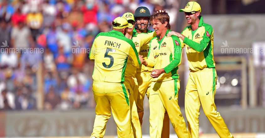 Australia's Adam Zamba celebrates with teammates after taking the wicket of Virat Kohli Australia's Adam Zamba celebrates with teammates after taking the wicket of Virat Kohli
