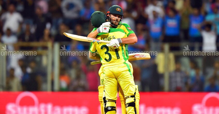 Australia's David Warner and Aaron Finch celebrate after beating India Australia's David Warner and Aaron Finch celebrate after beating India