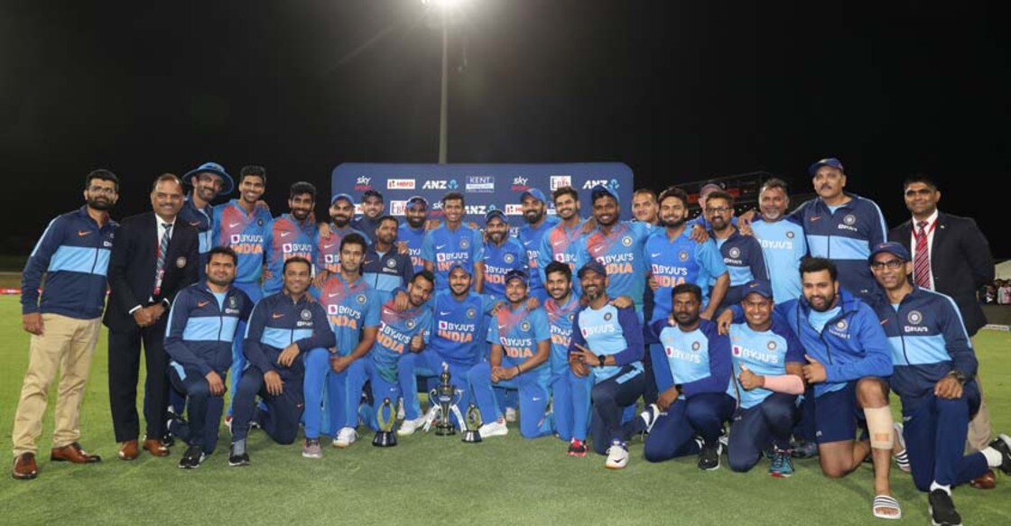 Indian players celebrate with the trophy