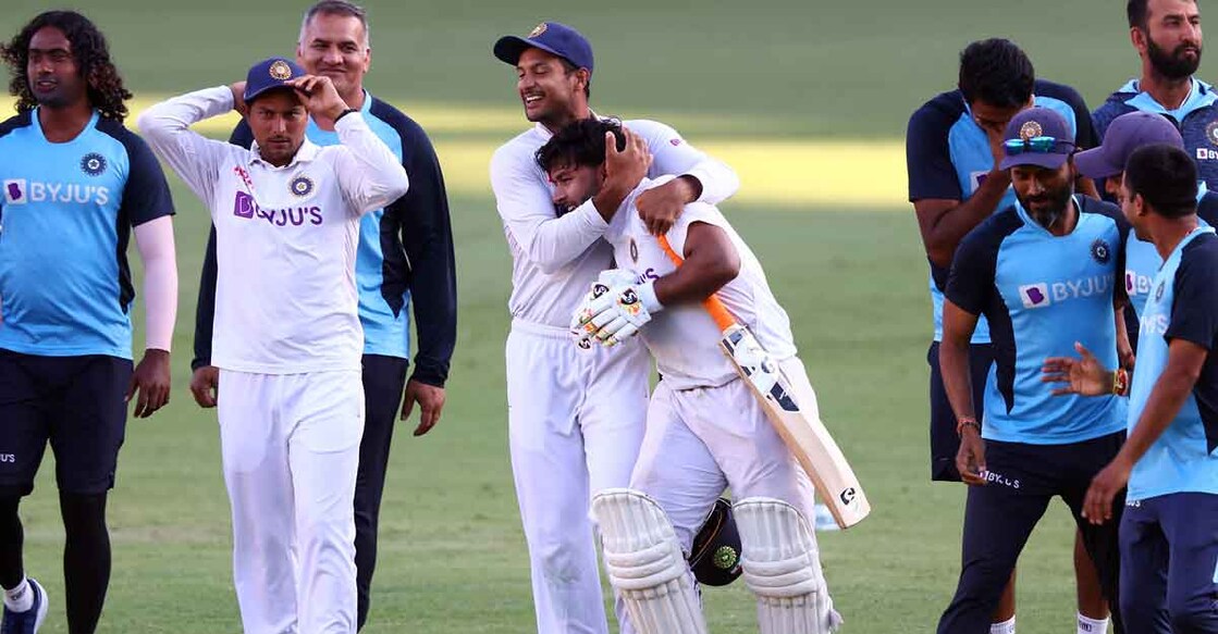 Mayank Agarwal hugs Rishabh Pant after the dramatic win. Photo: AFP