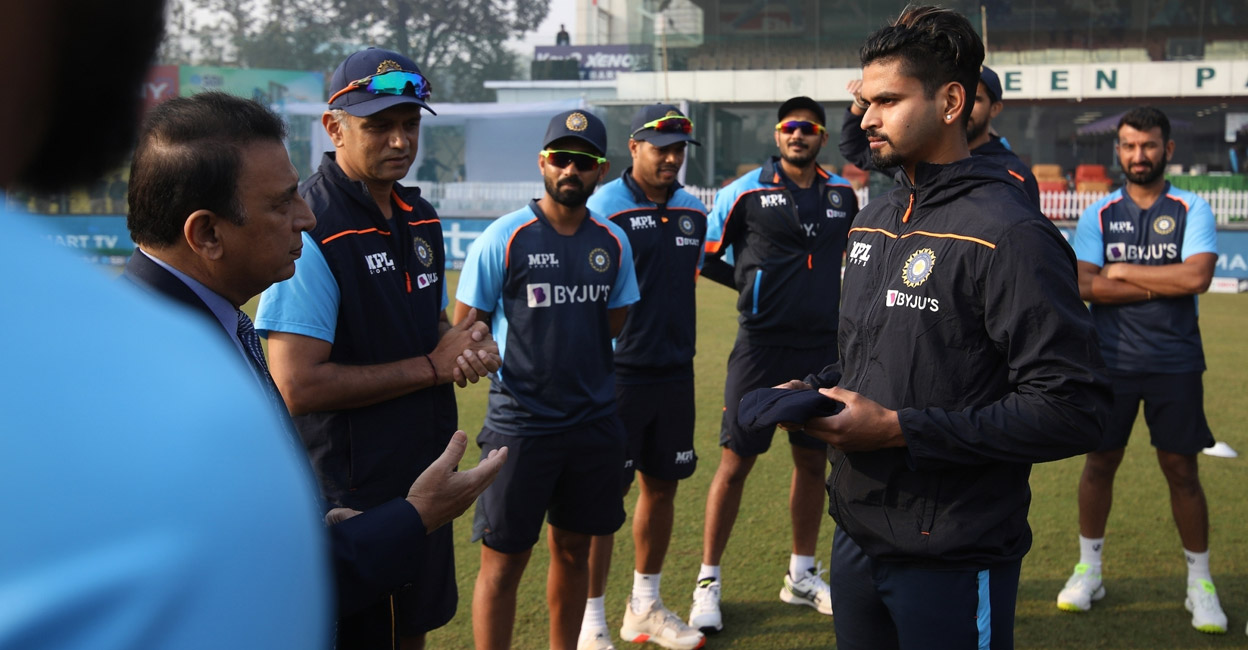 Shreyas Iyer receives the Test cap from Sunil Gavaskar. Photo: IANS
