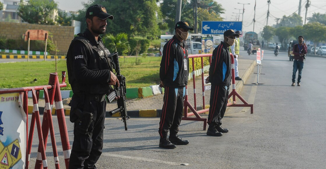 Security personnel stand guard outside the National Stadium in Karachi on November 8, 2021. File photo: AFP/Asif Hassan