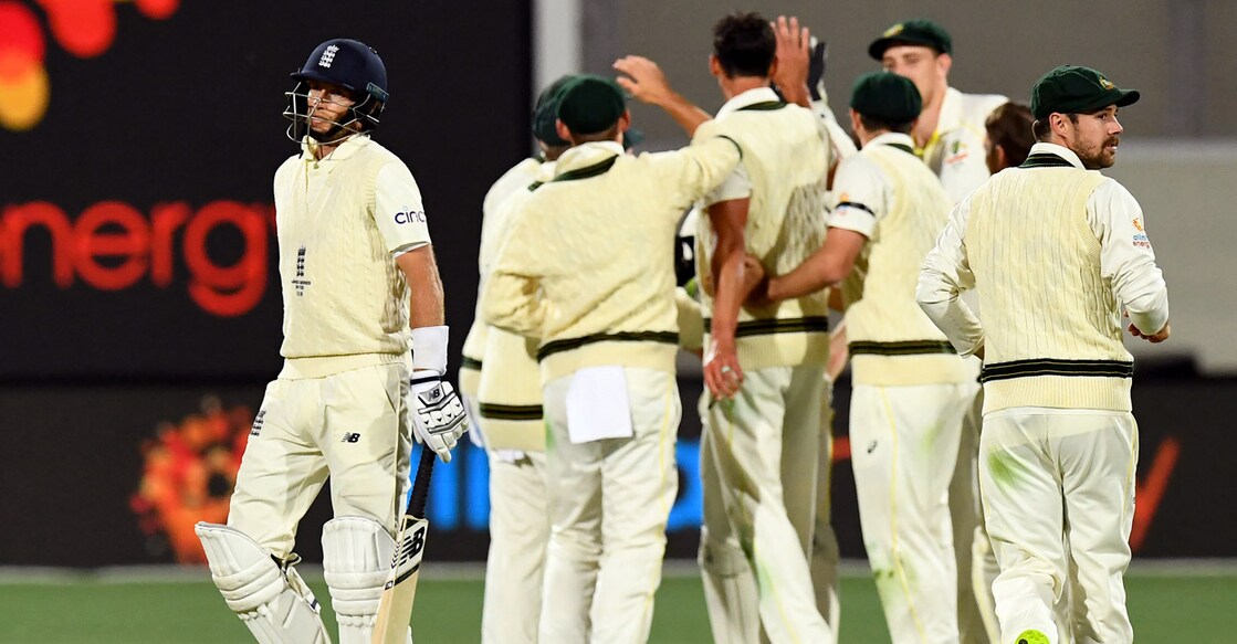 England captain Joe Root walks off after being dismissed by Australia's Mitchell Starc. Photo: AFP/William West