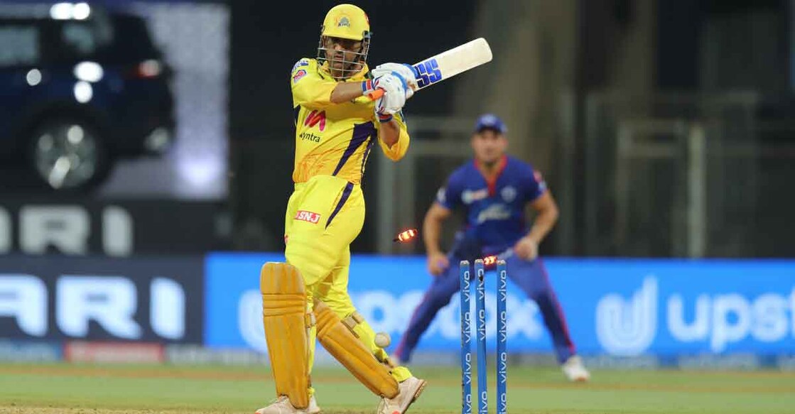M S Dhoni chops one on to the stumps off Avesh Khan. Photo: PTI/IPL