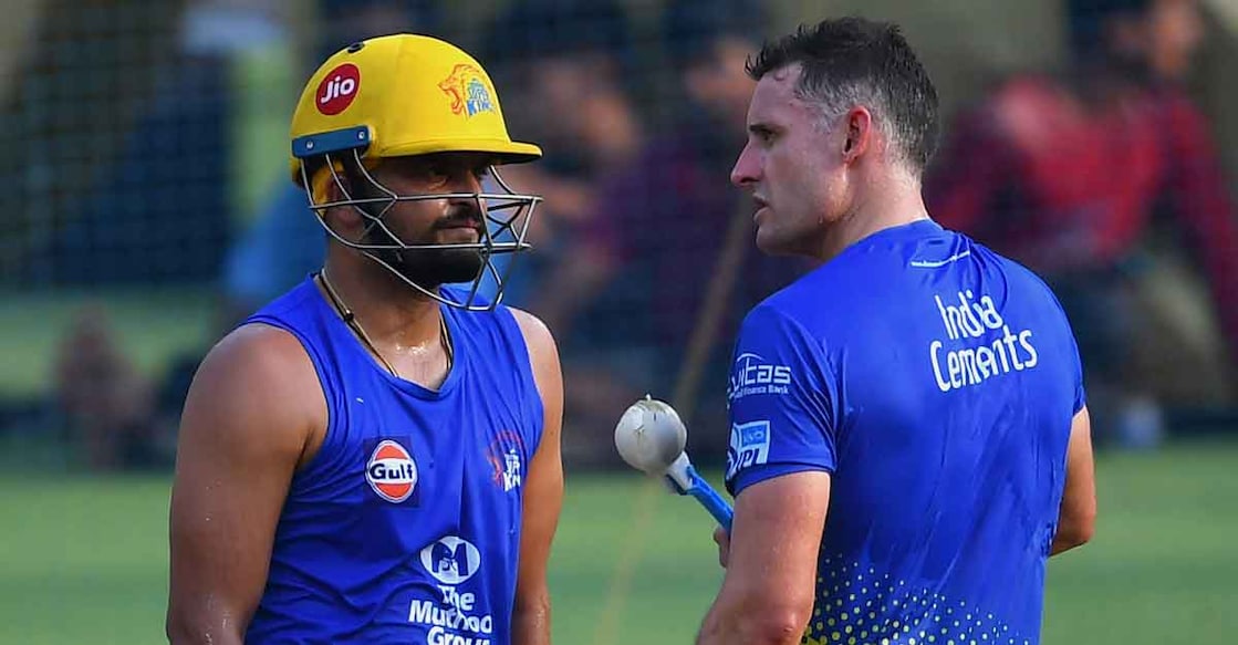 Mike Hussey, right, with CSK batting mainstay Suresh Raina. File photo: AFP