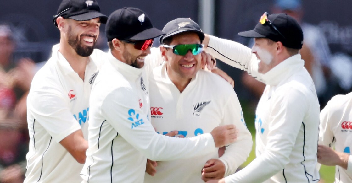 Ross Taylor, second right, ended his Test career on a winning note.Photo: AFP/
Marty Melville