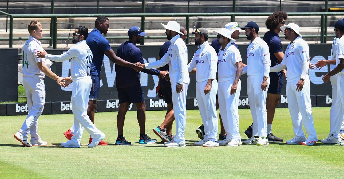 South African and Indian players greet each other at the end of the Cape Town Test. Photo: AFP/Rodger Bosch