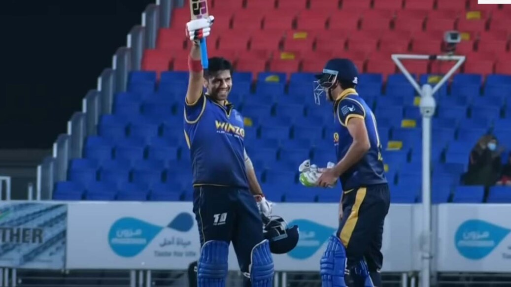 Naman Ojha celebrates his century. Mohammad Kaif is also seen. Photo: Screengrab/Sony Liv