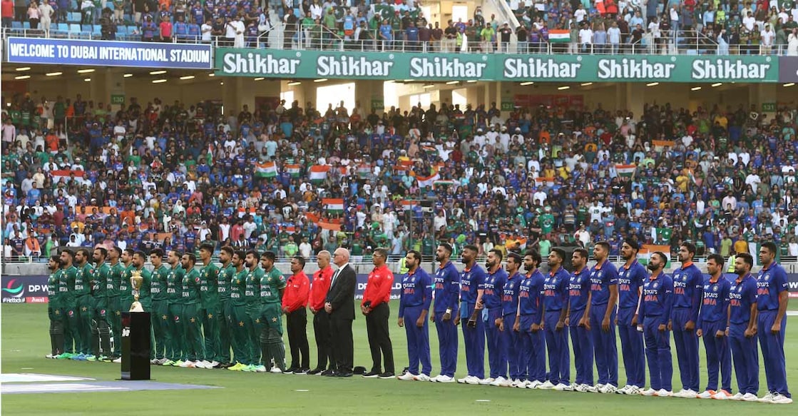 Pakistan and India players line up before the Asia Cup match on August 28, 2022. File photo: Reuters: Satish Kumar