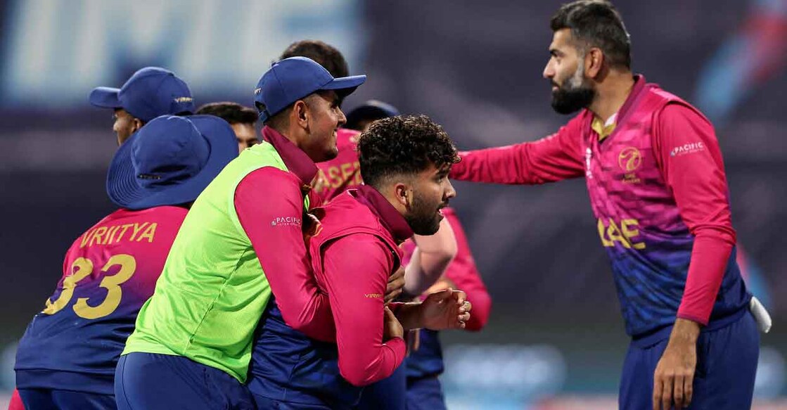 The UAE players celebrate the dismissal of David Wiese. Photo: AFP/Martin Keep