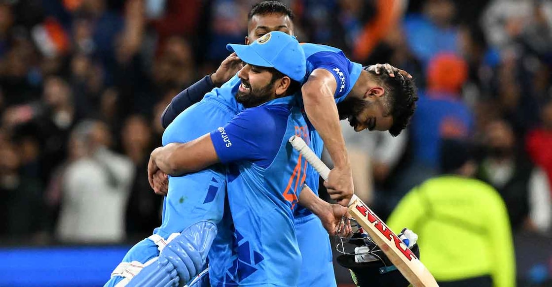 Rohit Sharma & Virat Kohli India skipper Rohit Sharma lifts Virat Kohli after the game. Photo: AFP/William West